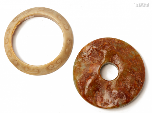 A CARVED JADE DISC AND A BANGLE