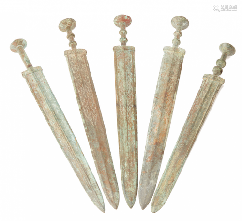 A GROUP OF FIVE ARCHAIC STYLE BRONZE SWORDS