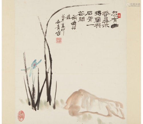 A CHINESE HANGING SCROLL OF REEDS BY A ROCK