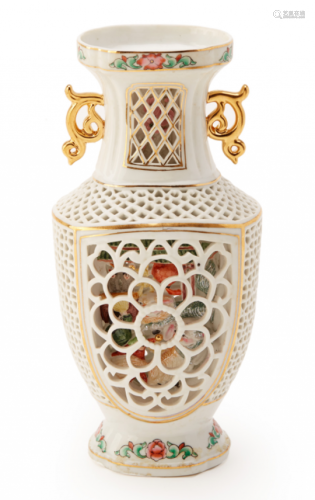 A RETICULATED PORCELAIN VASE