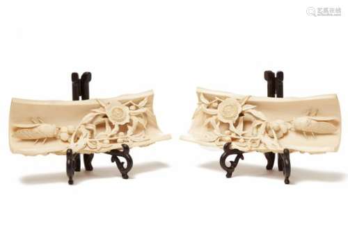 A PAIR OF CARVED IVORY WRIST RESTS, FEATURING CICADAS