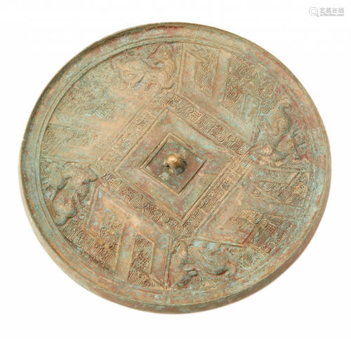 A 'FOUR DEERS' CIRCULAR BRONZE MIRROR