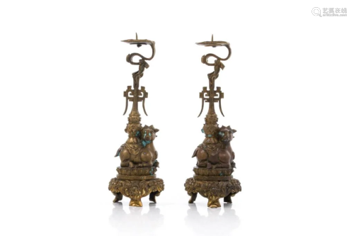 PAIR OF CHINESE METAL CANDLE HOLDERS