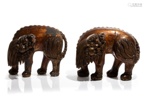 PAIR OF CHINESE GILT & LACQUERED WOOD LIONS