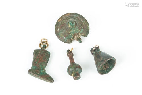 FOUR LURISTAN BRONZE AMULET PENDANTS