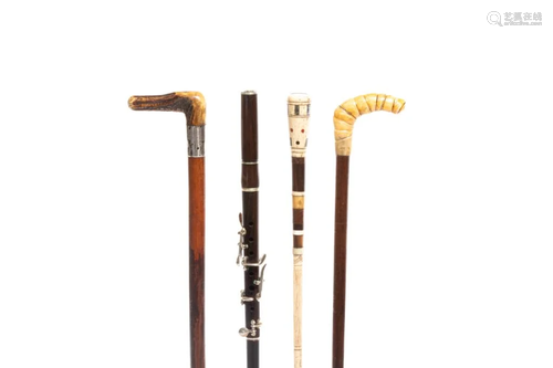 FOUR ANTIQUE MINIATURE CANES