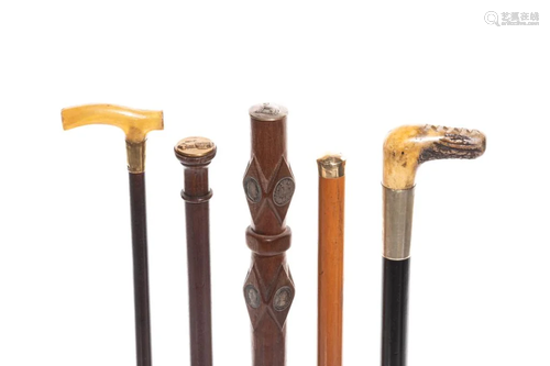 FOUR ANTIQUE MINIATURE WALKING STICKS