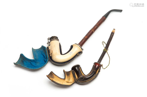 TWO PARTIALLY CASED SMOKING PIPES