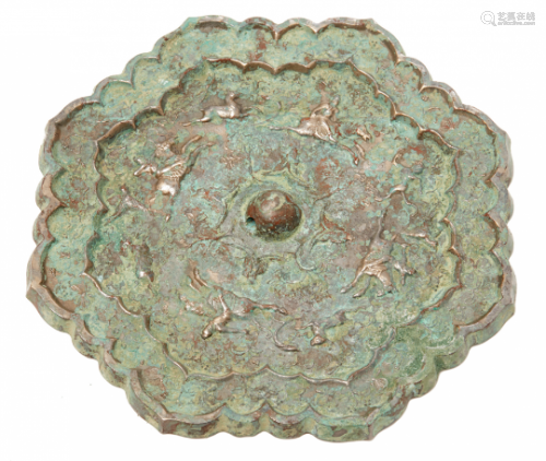 A LARGE OCTAFOIL BRONZE HUNTING MIRROR