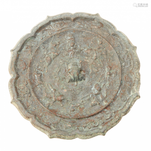 A PETAL LOBED BRONZE HUNTING SCENE MIRROR