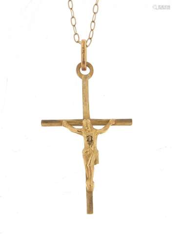 9ct gold crucifix pendant on a 9ct gold necklace, the pendant 3cm in length, 0.8g : For Further