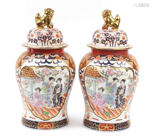 Large pair of Chinese porcelain baluster vases and covers hand painted with figures and flowers,