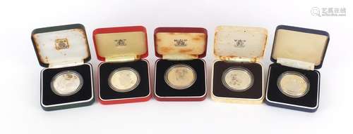 Five silver proof commemorative coins including Gambia, Commonwealth games and St Helena 75th