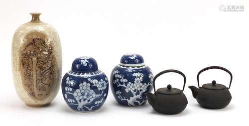 Chinese porcelain and two cast iron teapots, including a pair of blue and white prunus ginger