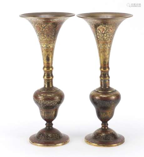 Pair of Indian brass vases, enamelled and engraved with flowers, 30cm high : For Further Condition