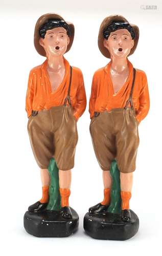 Pair of 1920's hand painted plaster figures of boys wearing hats, each 61cm high : For Further