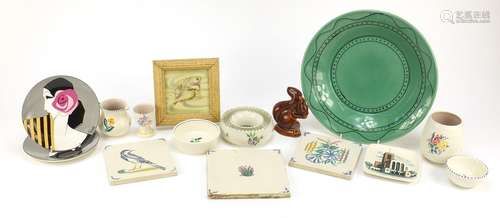 Poole pottery including tiles, Art Deco style plates and a large green shallow dish, the largest