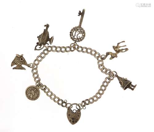 Silver charm bracelet with silver charms including Bambi and a genie's lamp, 20.5g : For Further