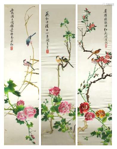 Set of three Chinese silk panels embroidered with birds amongst flowers, each with calligraphy, each