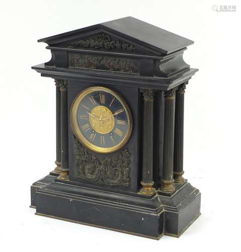 Victorian black slate mantel clock with bronzed Corinthian pillars the circular dial having Roman