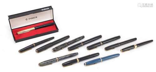 Eleven vintage fountain pens, most with gold nibs, including Parker 51 with case, marbleised