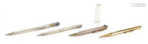 Four propelling pencils and a glass Intaglio desk seal, including a sterling silver example : For