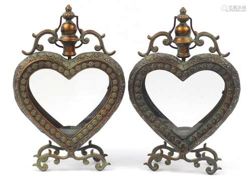 Pair of ornate bronzed love heart design candle holders, each 46.5cm high : For Further Condition