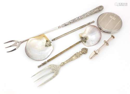 Silver and white metal flatware including a large Victorian silver handled toasting fork, two spoons