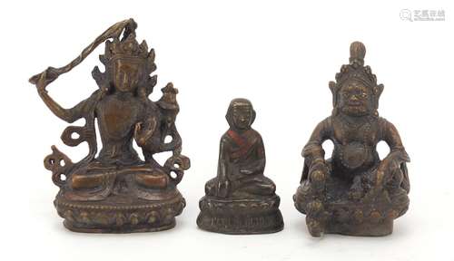 Three Chino-Tibetan figures of Buddha, the largest 8cm high : For Further Condition Reports Please