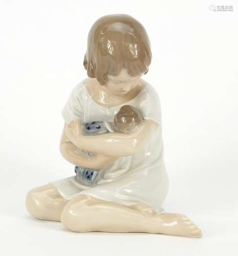 Royal Copenhagen figurine of a girl holding a doll, numbered 1938, 13cm high : For Further Condition