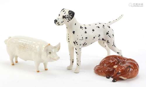 Three Beswick animals comprising a CH Wall champion boy pig, Dalmation and fox, the largest 20.5cm