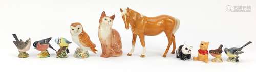 Nine Beswick collectable animals including owl 2026, seated cat 1030, horse, panda and Winnie the