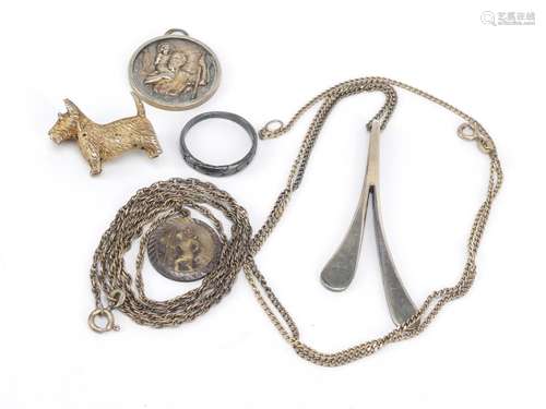 Silver jewellery including a Scottie dog brooch, St Christopher pendants and an Avon pendant on