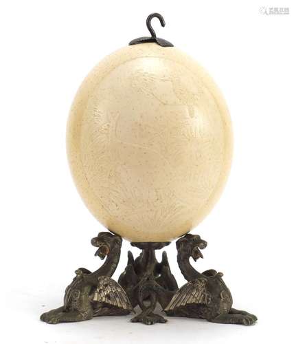 Australian carved emu egg on silver plated griffin stand, 21.5cm high : For Further Condition