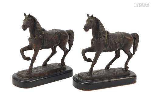 Matched pair of bronzed horses raised on ebonised bases, each 16.5cm high : For Further Condition