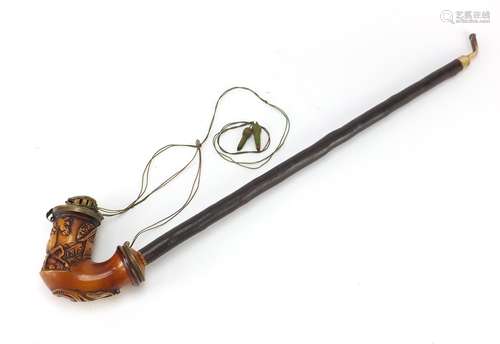 Large Continental smokers pipe, the bowl decorated with a horse, dated 1815, 63cm in length : For