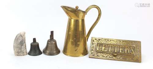 Sundry items including an Art Nouveau style brass letter box, two antique bells and a scrimshaw