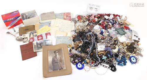 Sundry items including costume jewellery, soldier's service and pay book, black and white