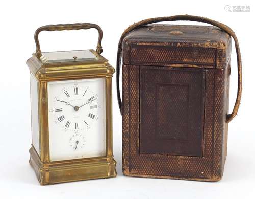 French brass cased repeating carriage clock with leather travelling case by François-Arsene