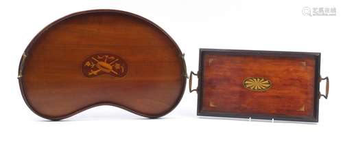 Two mahogany trays including an Edwardian inlaid kidney shaped example with brass handles, the