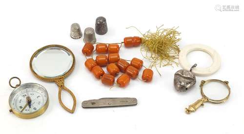 Objects including a silver flanked folding pocket knife, silver thimbles, gilt metal lorgnettes,