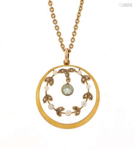 Edwardian 9ct gold aquamarine and seed pearl pendant, 2.5cm in diameter on a 9ct gold necklace, 38cm