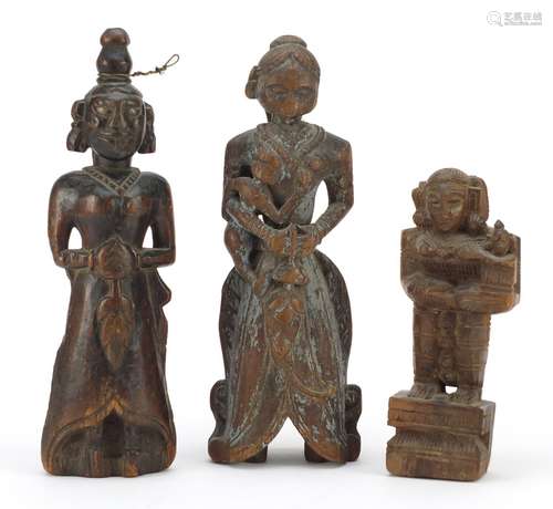 Three 18th/19th century Indian wood carvings of deities, the largest, 30cm high : For Further