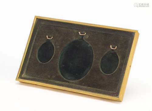 Victorian gilt brass portrait miniature, easel case with three oval apertures, 20cm x 12.5cm : For