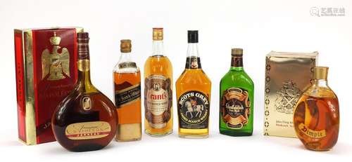 Six bottles of whisky and Armagnac comprising Grants, Scots Grey, Glenfiddich, Johnnie Walker