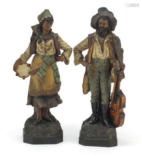 Large pair of Continental cold painted terracotta figures of musicians in the manner of