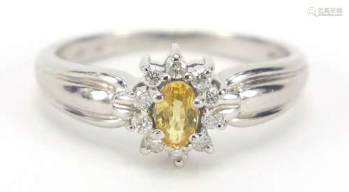 Platinum yellow stone and diamond ring, IW maker's mark, size P, 4.9g : For Further Condition