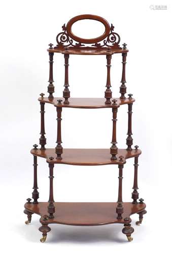 Victorian mahogany serpentine front four tier wotnot with mirrored back, 132cm H x 76cm W x 38cm D :