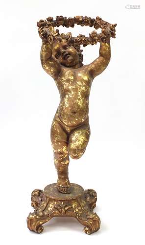 Large floor standing gilt figure of Putti, 105cm high : For Further Condition Reports Please Visit