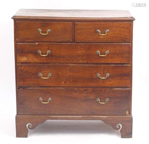 Georgian oak five drawer chest, fitted with two short above three long graduated drawers, raised